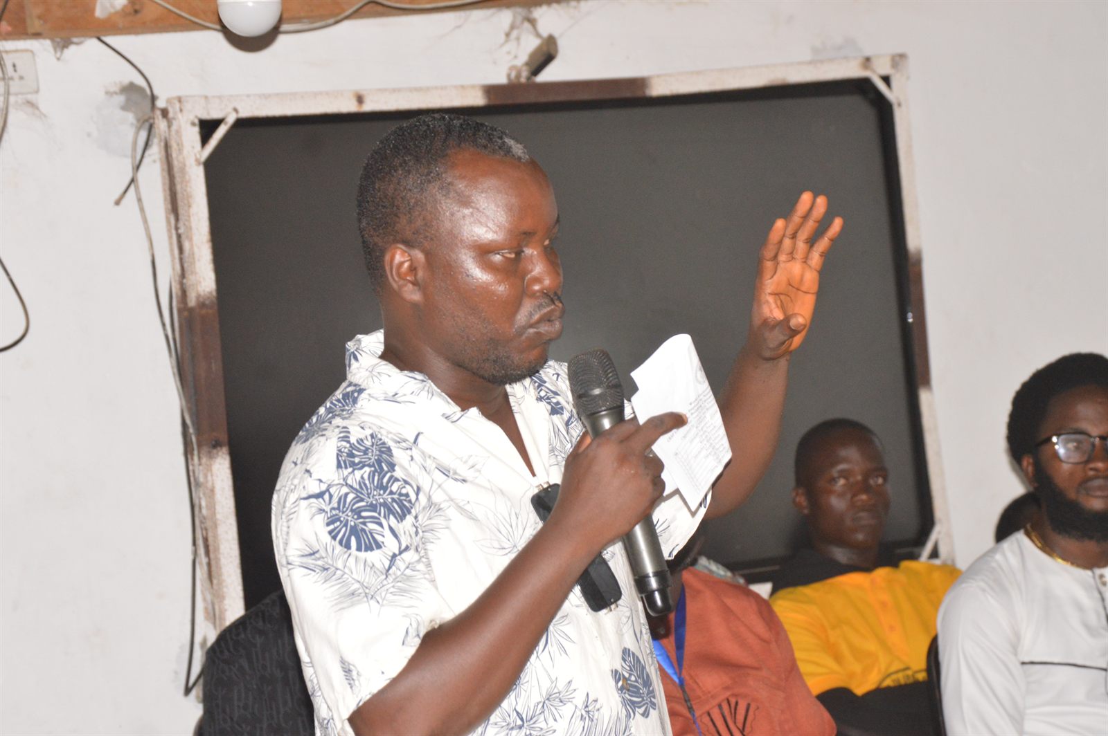 Clarence, representing the Environmental Protection Agency Compliance Unit, participating in the indoor awareness session.