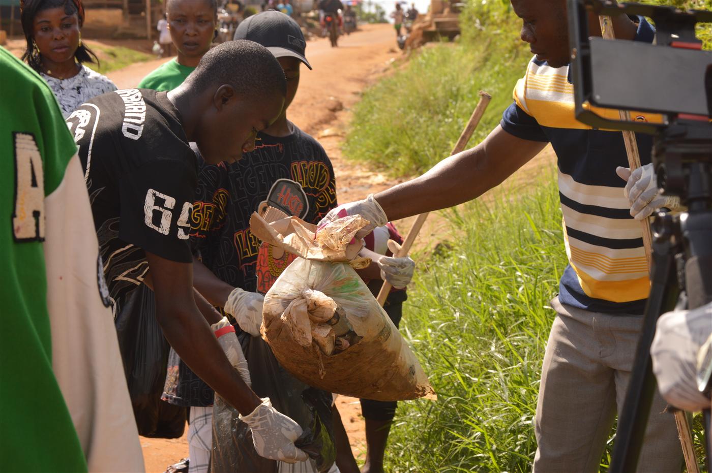 Youth volunteers demonstrating leadership in environmental action.