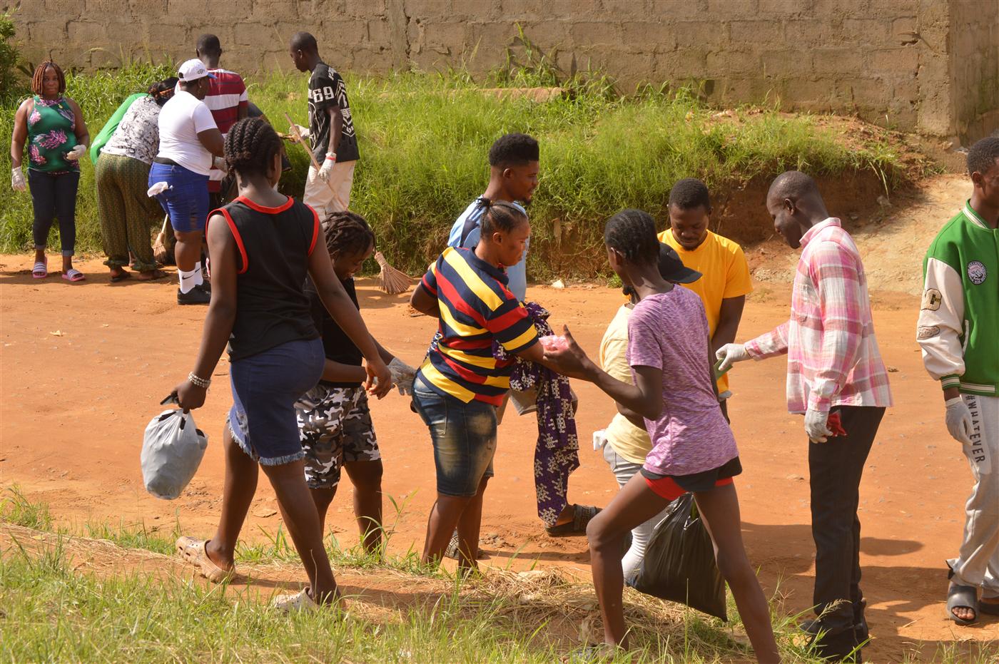 Community participants working together during CRAF's World Environment Day activity.