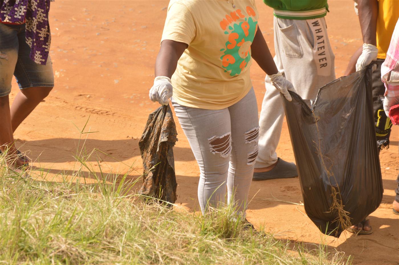 CRAF volunteers removing waste from areas affected by poor disposal.