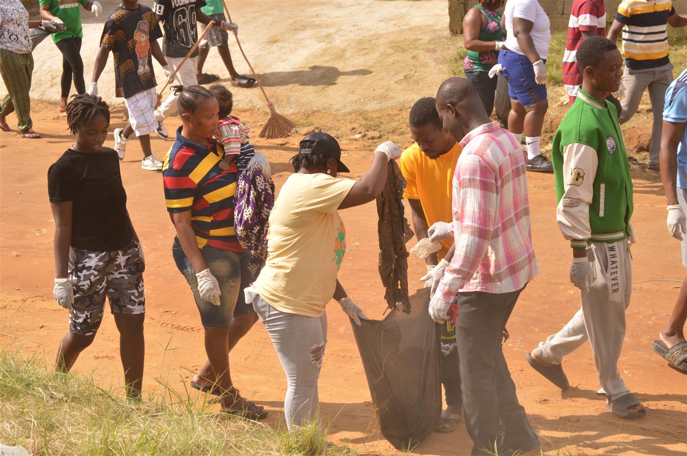 Community members supporting practical action for a cleaner environment.