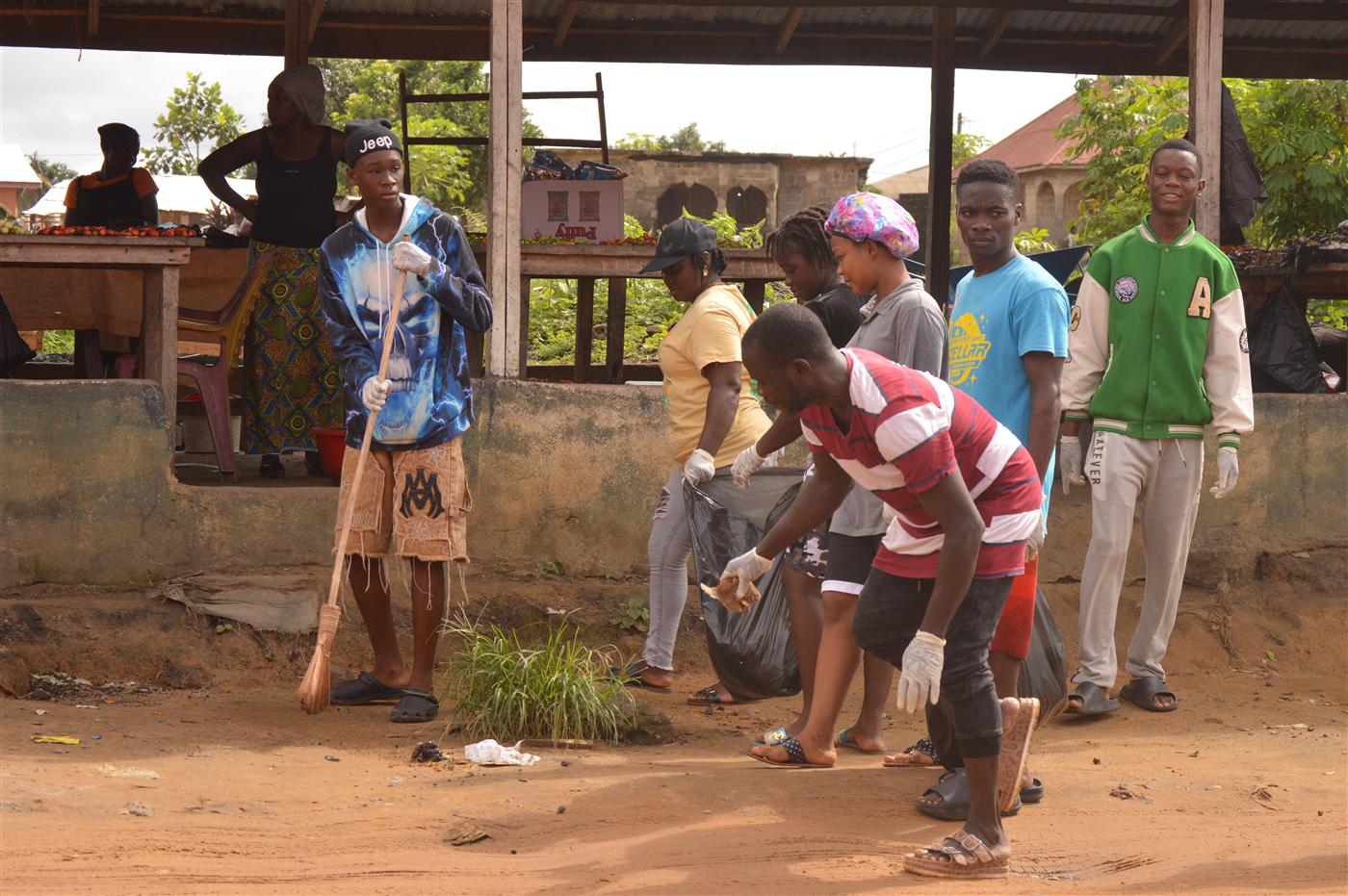 Participants cleaning streets and public spaces as part of CRAF's World Environment Day observance.