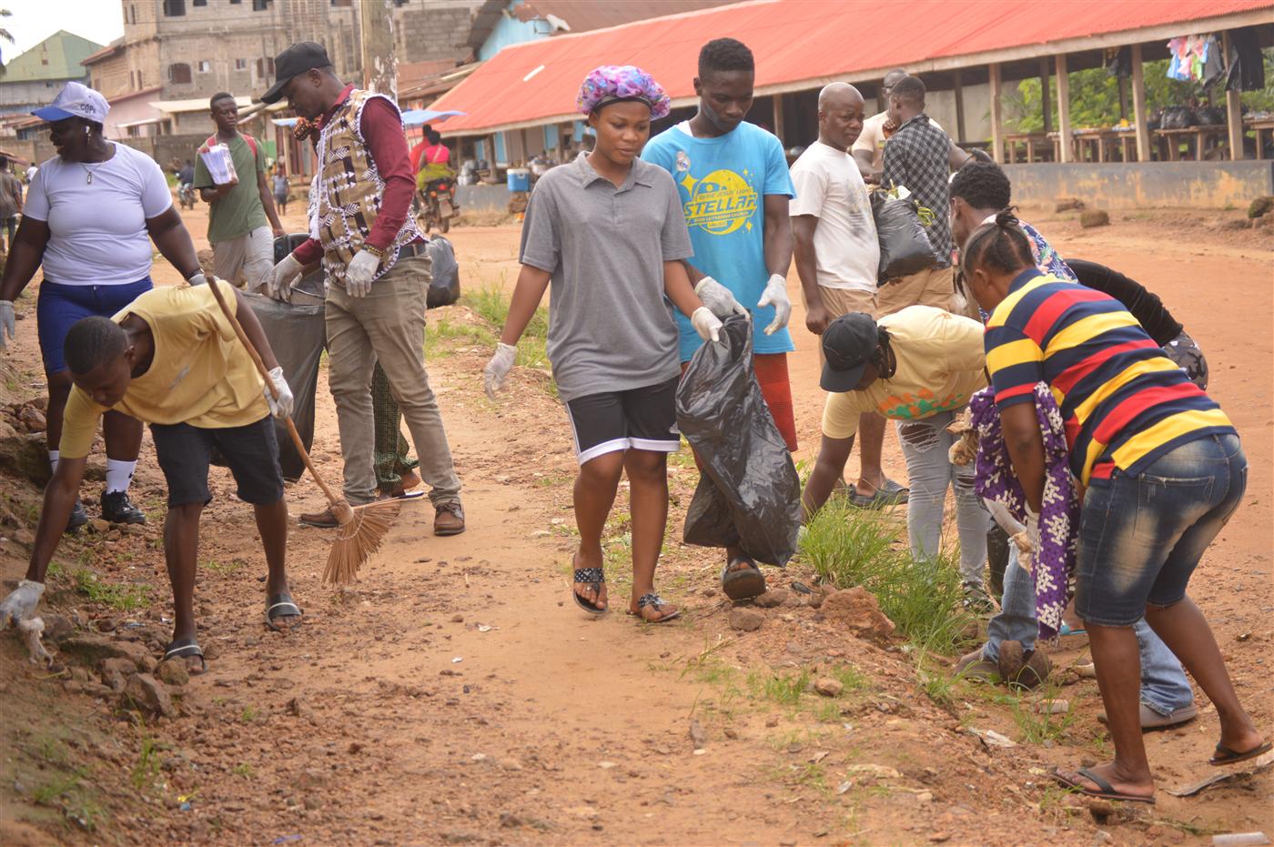 CRAF volunteers and residents working together to improve community cleanliness.
