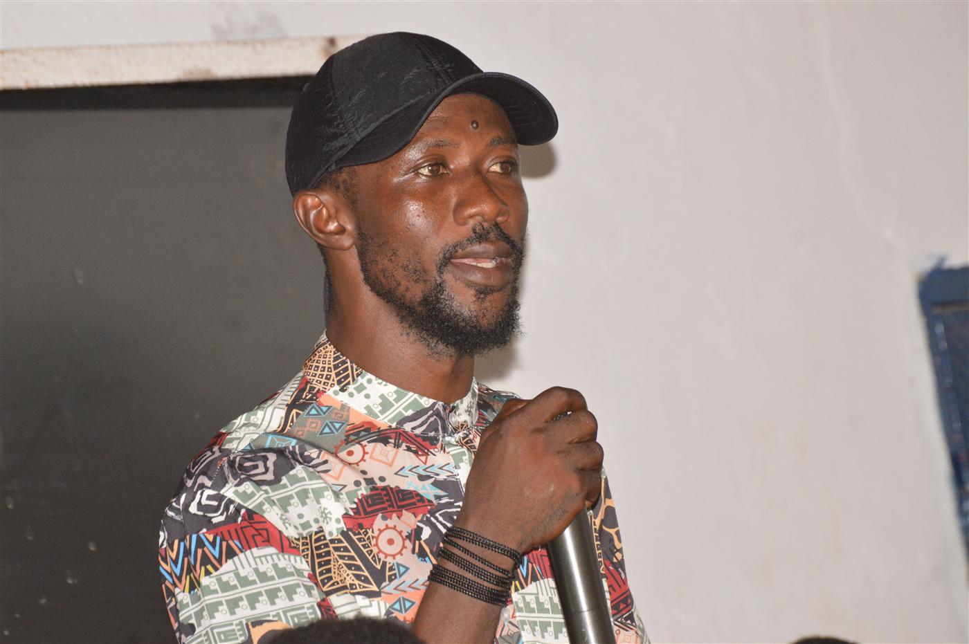Community partner speaking during the World Environment Day indoor session.