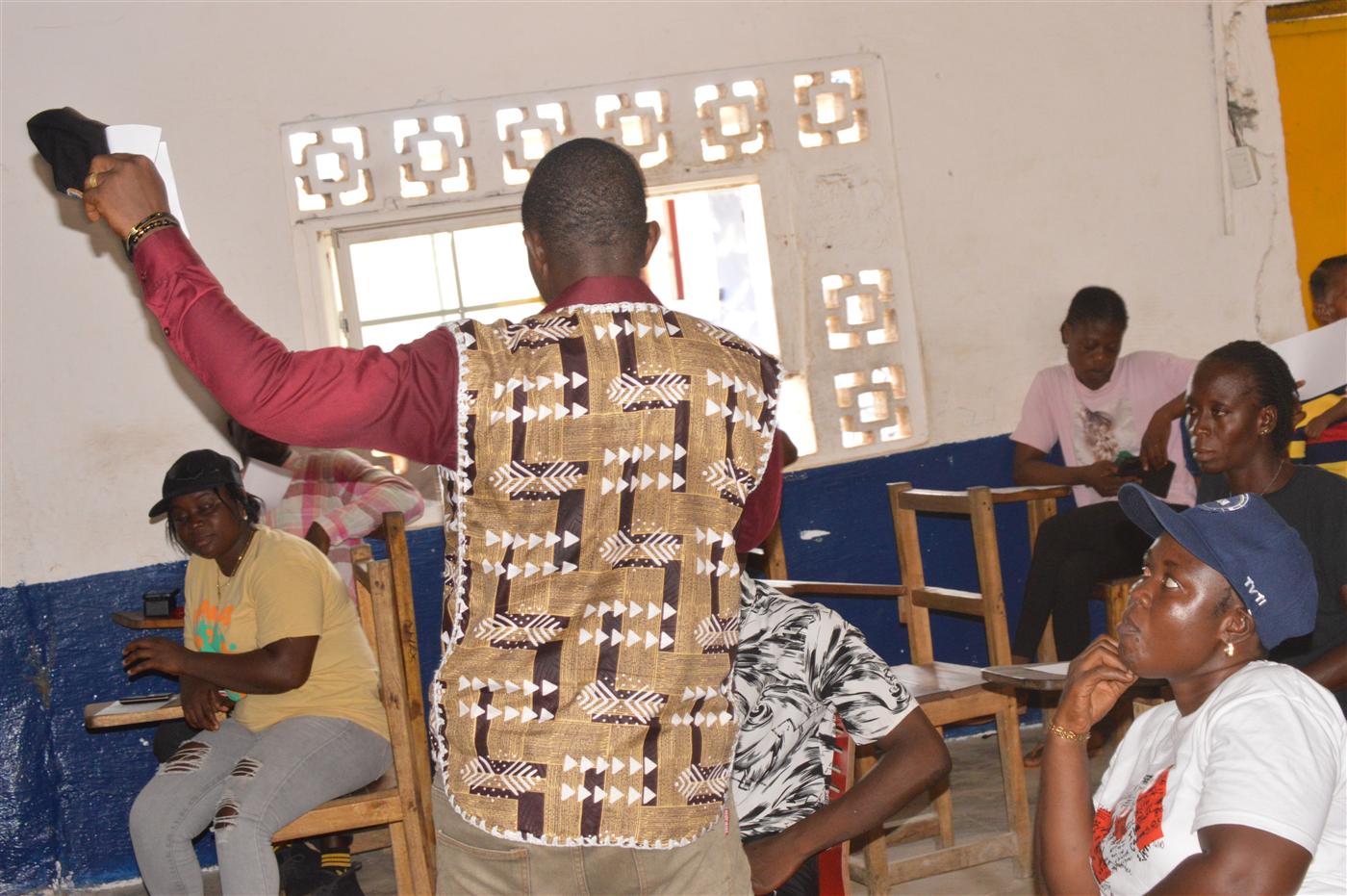 Participants engaging in discussion during the indoor awareness session.