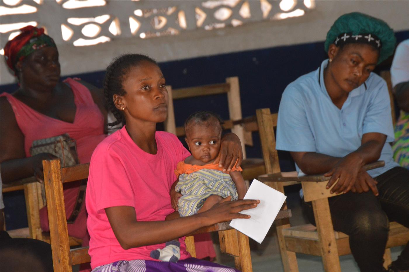 Residents listening during CRAF's World Environment Day indoor education session.