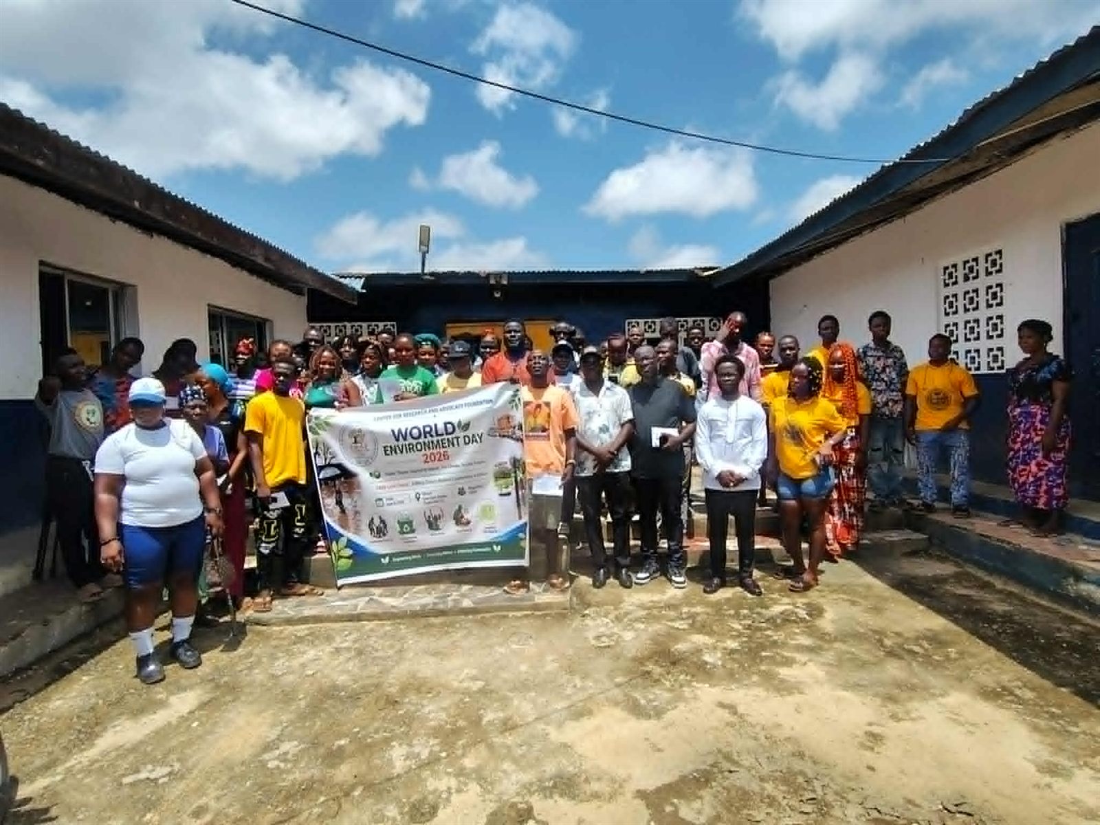 CRAF team members and volunteers standing together after the World Environment Day community clean-up.